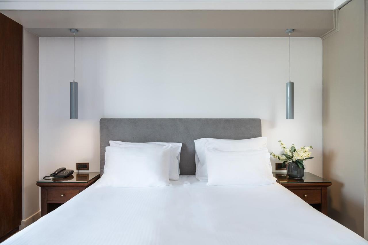 普拉塔尼亚斯港海滩度假酒店及Spa中心 Platanés 外观 照片 A bedroom at the hotel